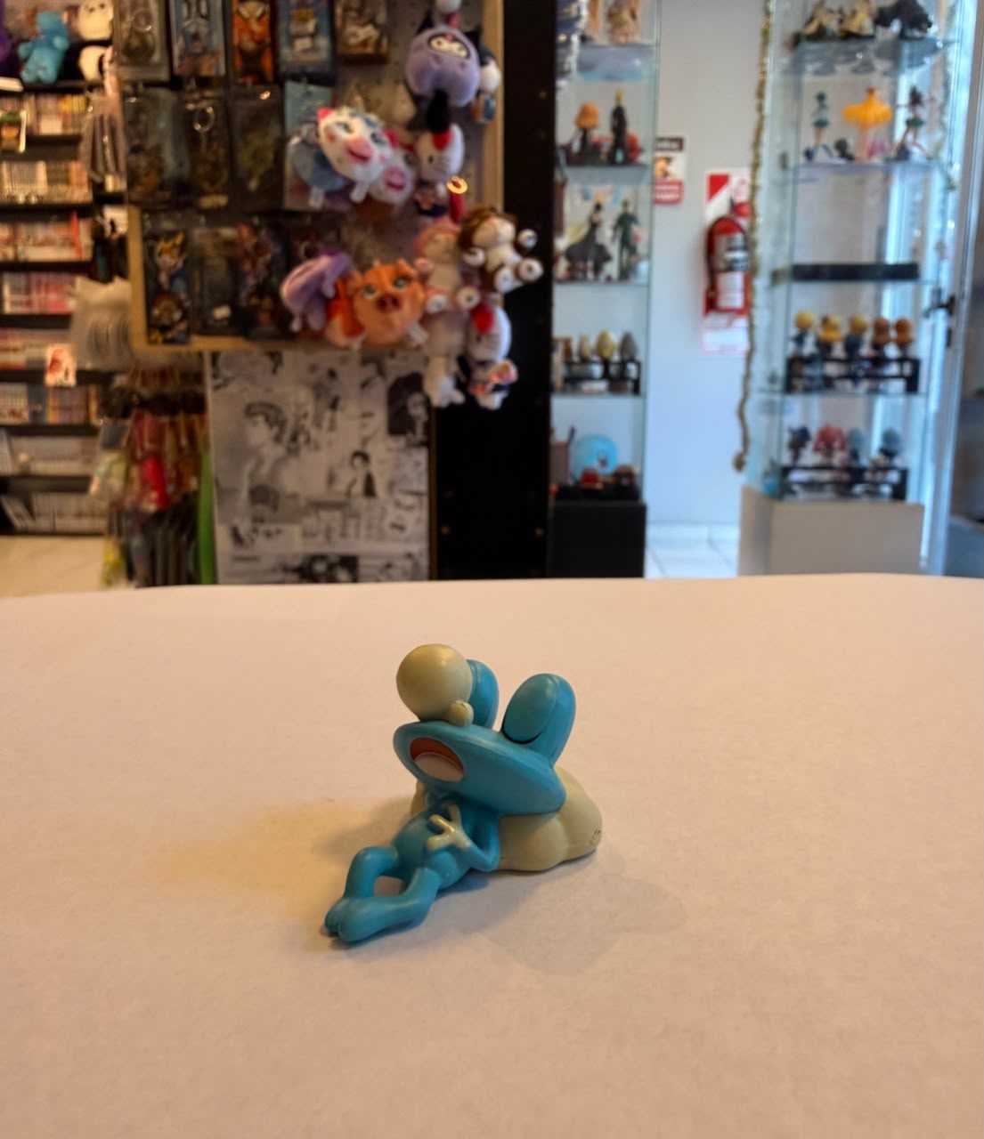 FIGURA GASHAPON DE FROAKIE DURMIENDO